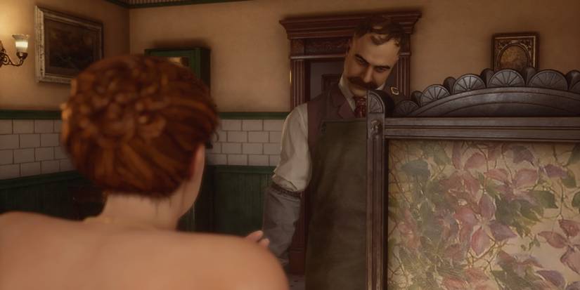 Holmes wielding a blade and about to slash Marie in Dark Pictures: The Devil in Me 